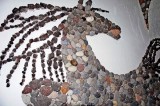 Un mosaico a figura di cervo, lungo una parete della Casa-Museo. Ischia